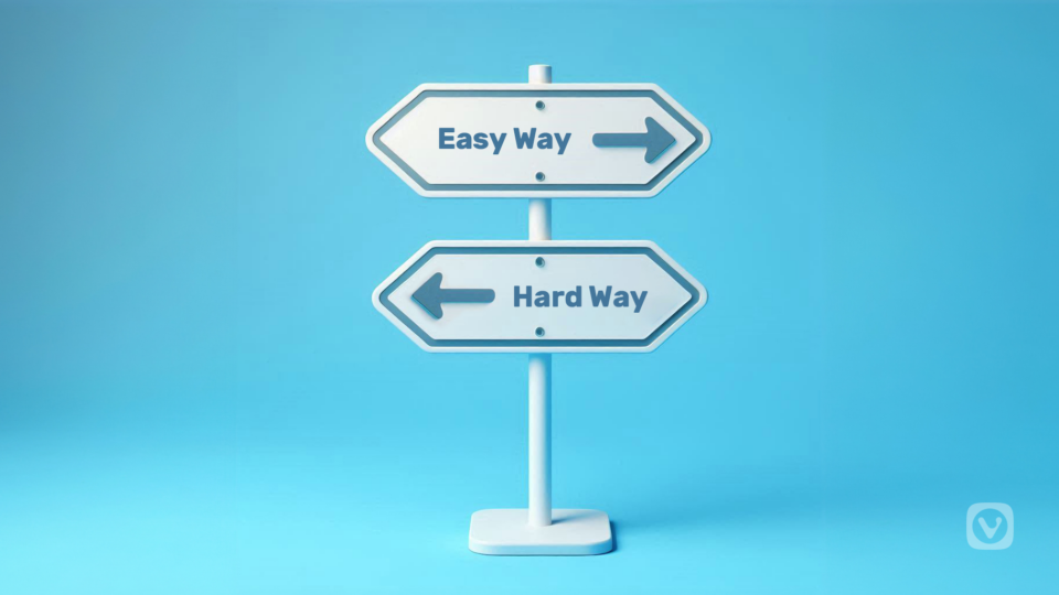 Image of a two signs pointing left and right. The board pointing left says Hard Way and the one pointing right says Easy Way