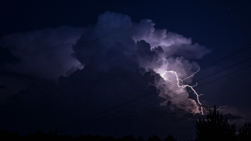 Lighting on dark purple skies